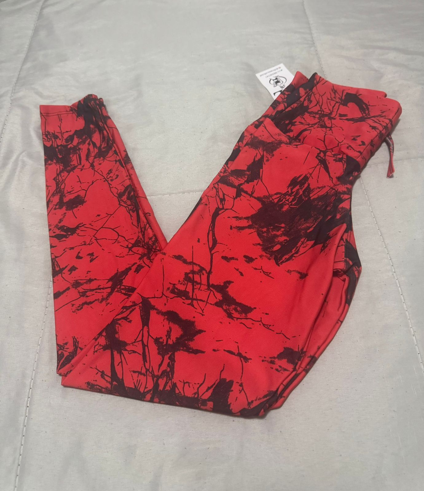 Calça Fitness Estampada Vermelho e Preto