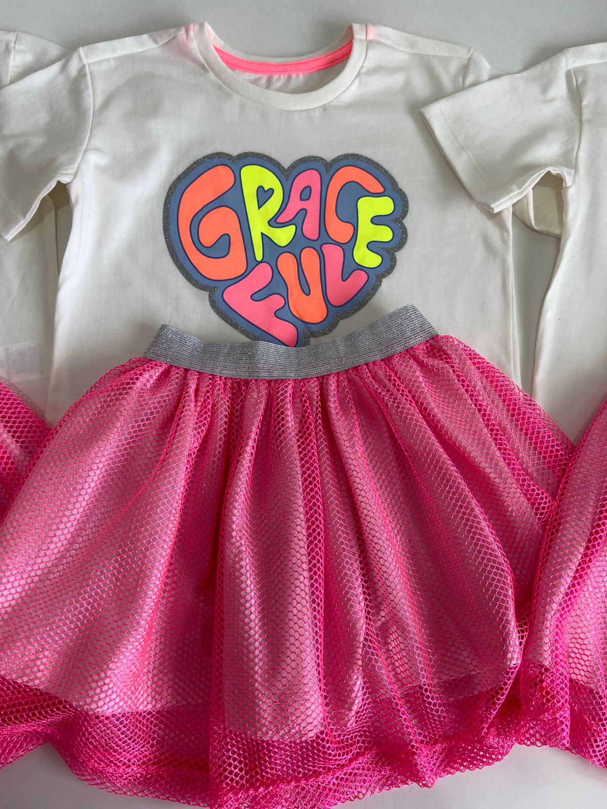 Conjunto neon saia telinha
