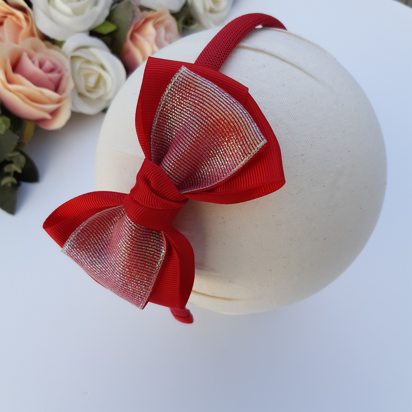 TIARA LAÇO CRUZADO FITA IRIZADA