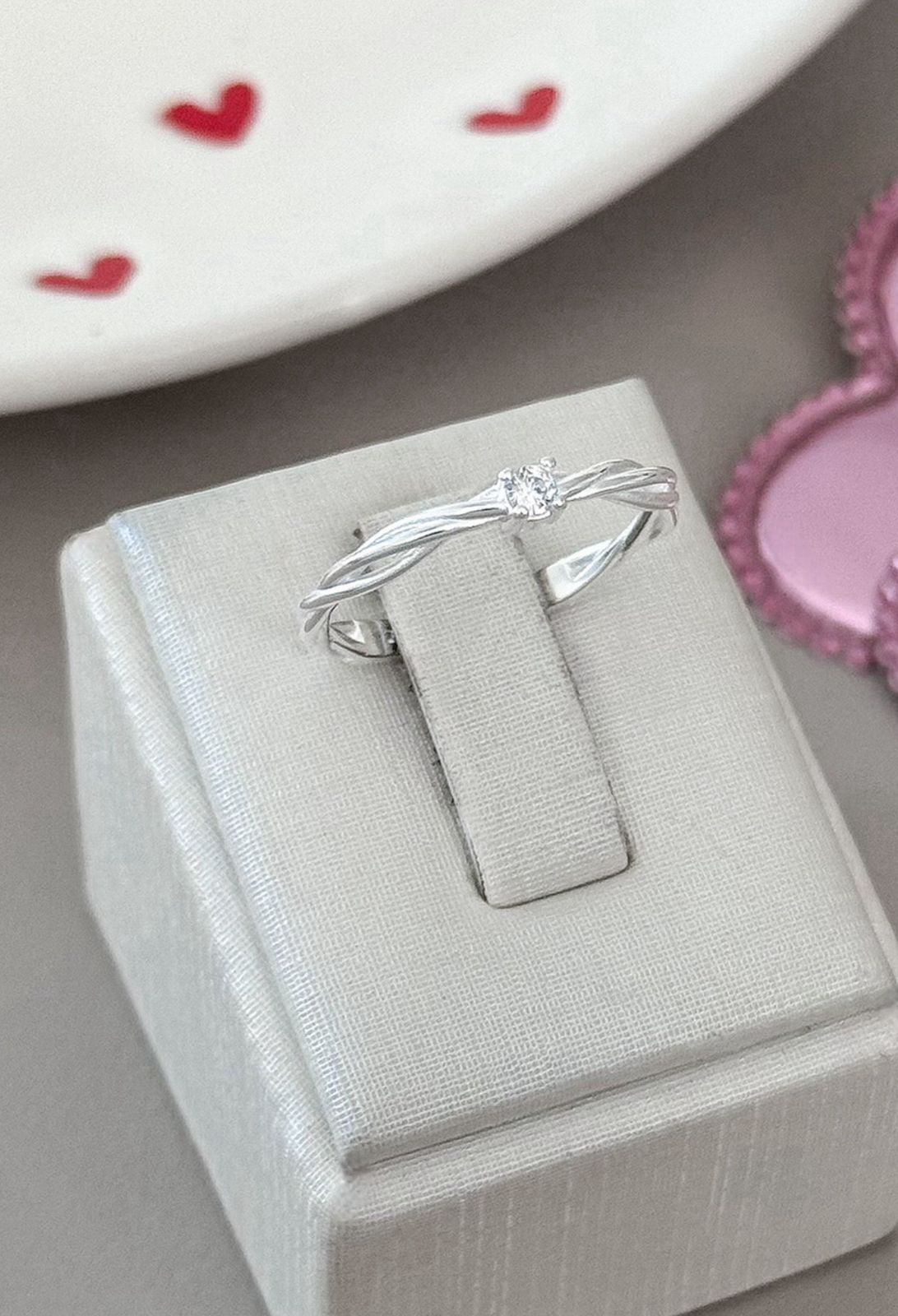 Anel soliário trançado