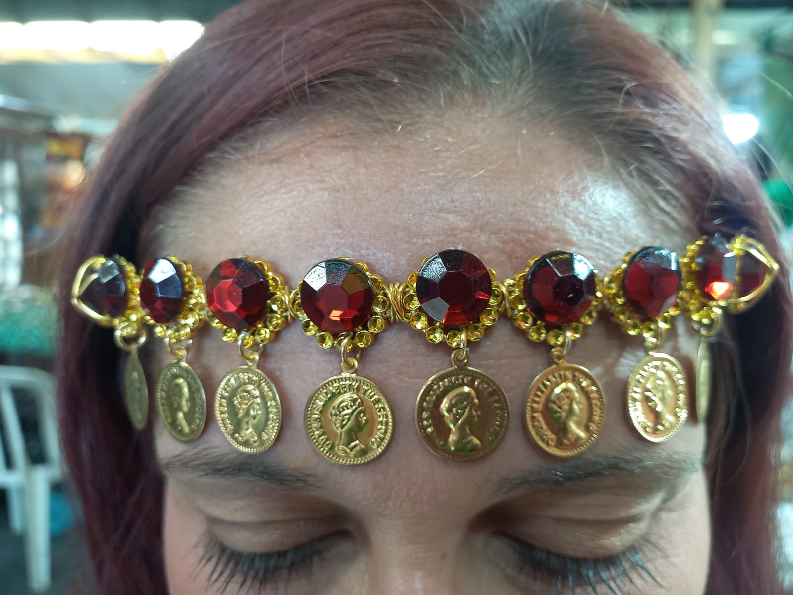 testeira moedas vermelha